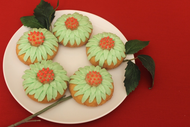 Frosted Doughnut Flowers Garnished With Leaves