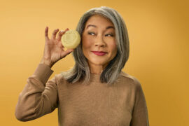 history of sugar cookies woman holding a sugar cookie