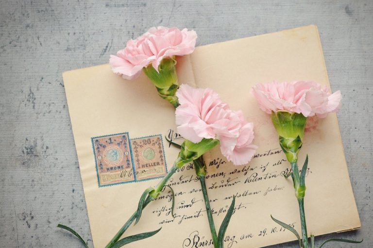 Photo of a letter with flowers
