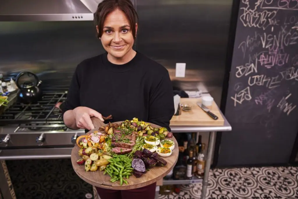 Photo of Antonia Lofaso serving food