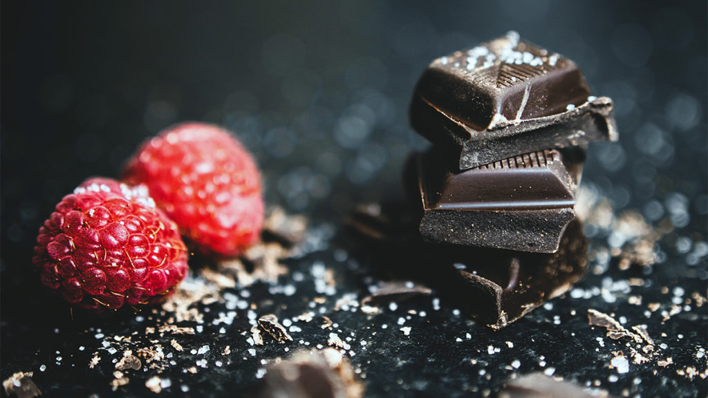Photo of raspberries and dark chocolate