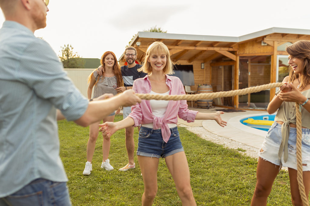 housewarming party ideas with friends doing the limbo at a housewarming party