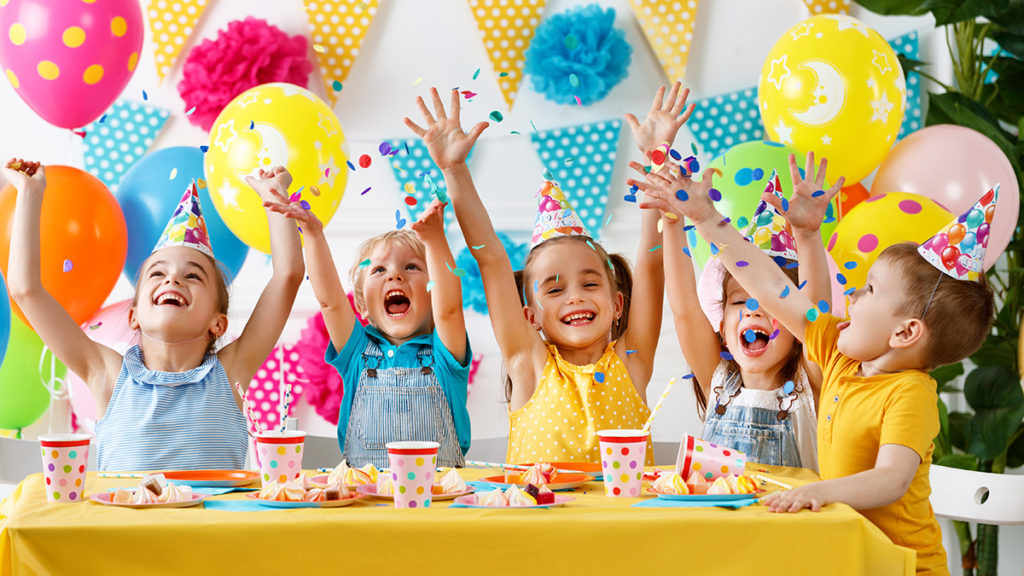 Photo of kids at a crafting birthday party