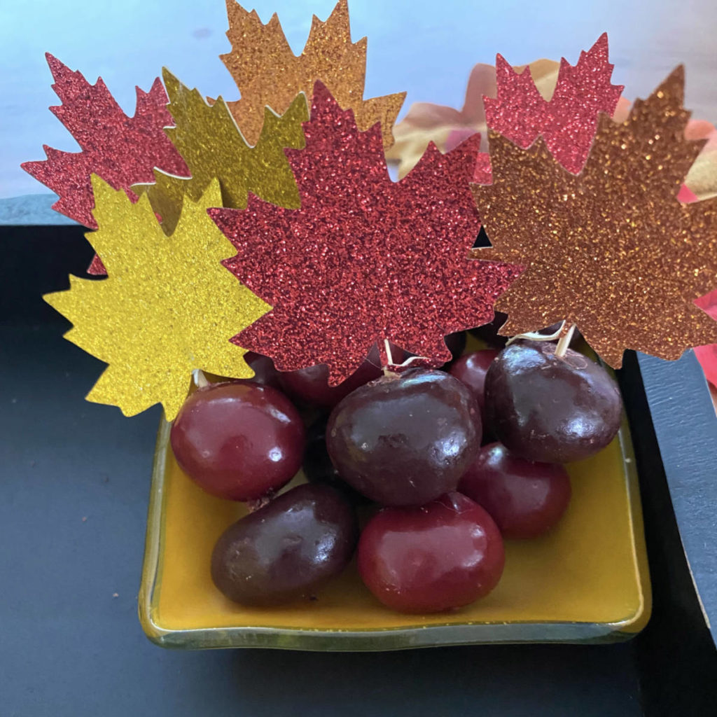 fall dessert board with close-up of chocolate-covered cherries