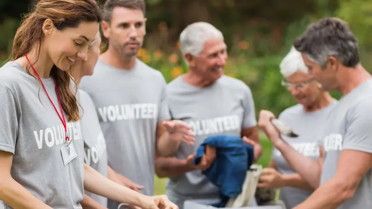 Photo of people volunteering on International Day of Charity