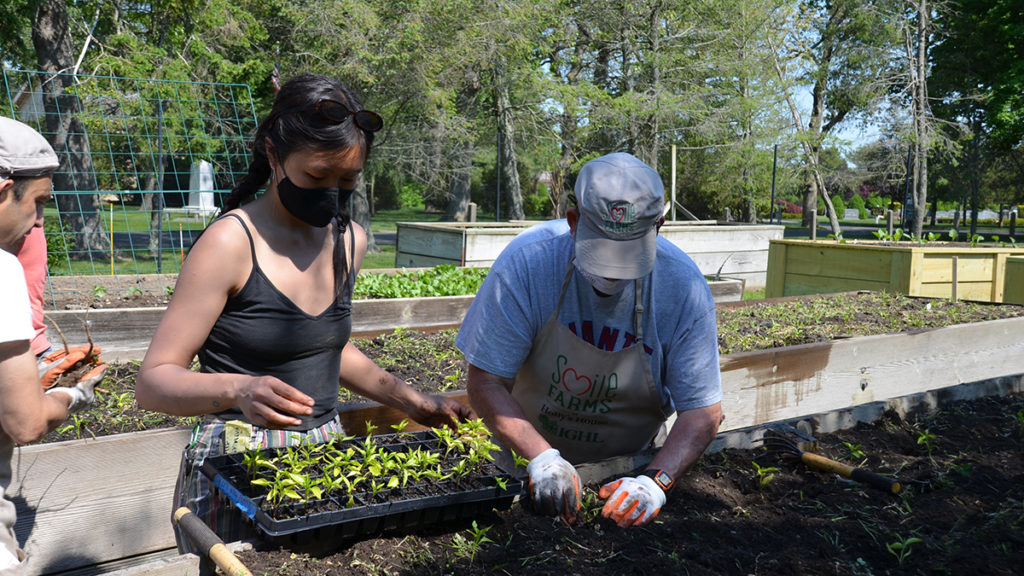 Photo of Smile Farms Farmers making hot sauce