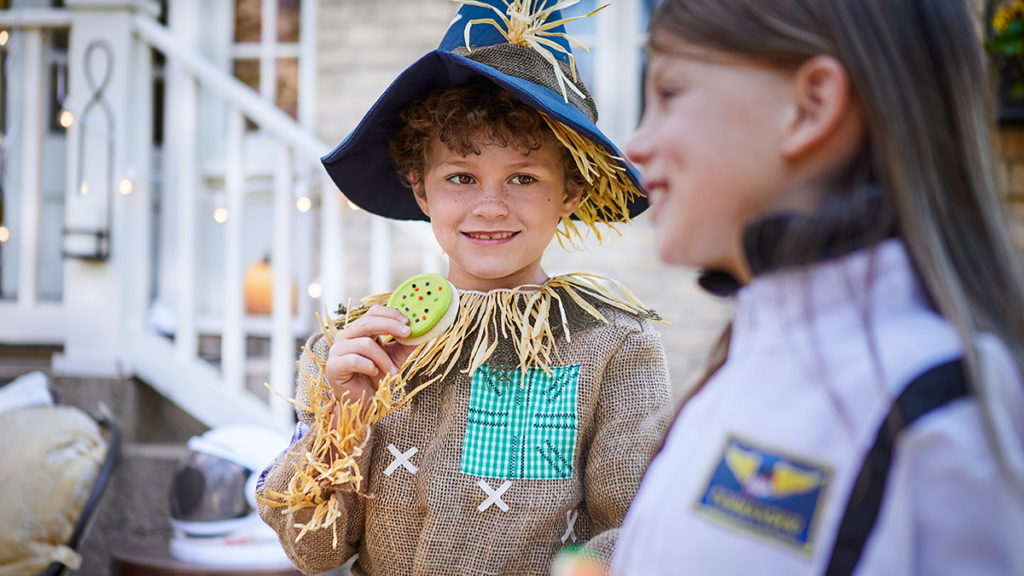 Photo of kids dressed up in Halloween costumes