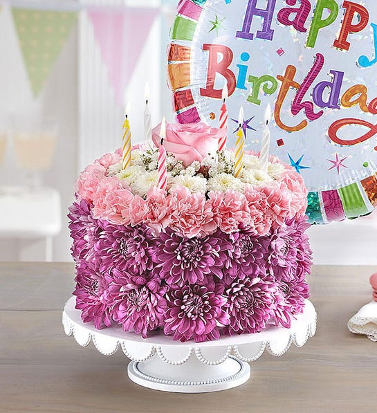 milestone birthday gifts with flower cake