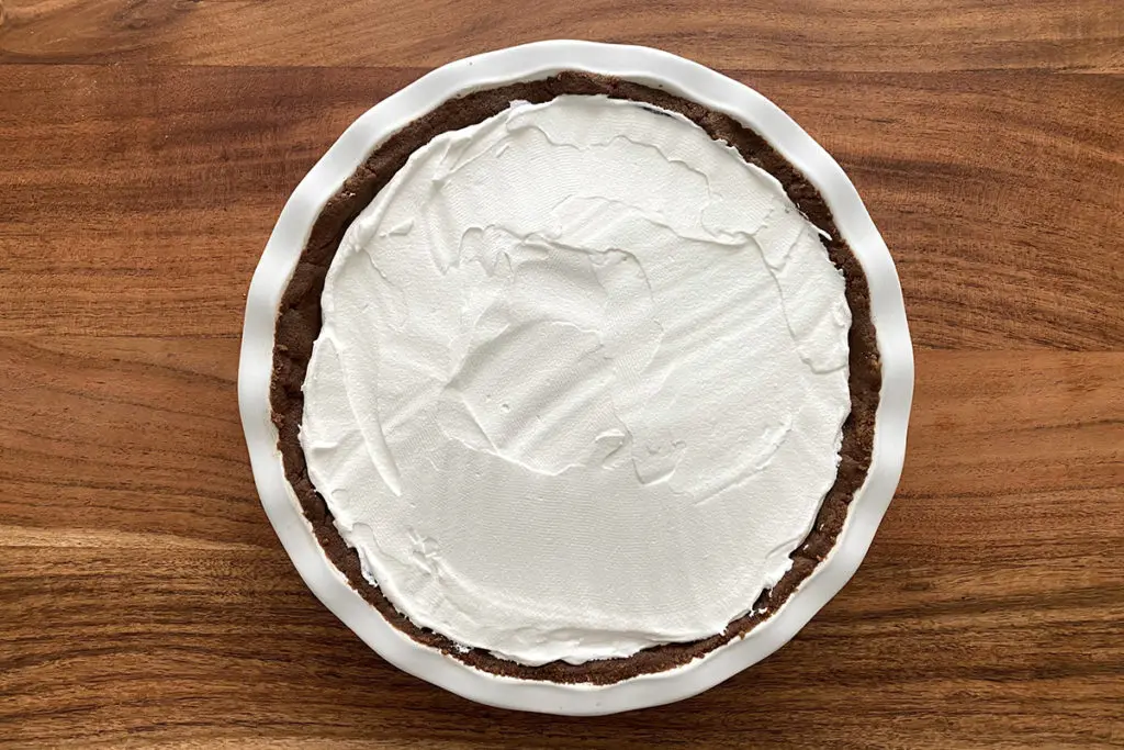 Photo of pumpkin chocolate pudding pie with frosting