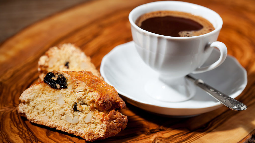 Photo of biscotti and a cup of coffee
