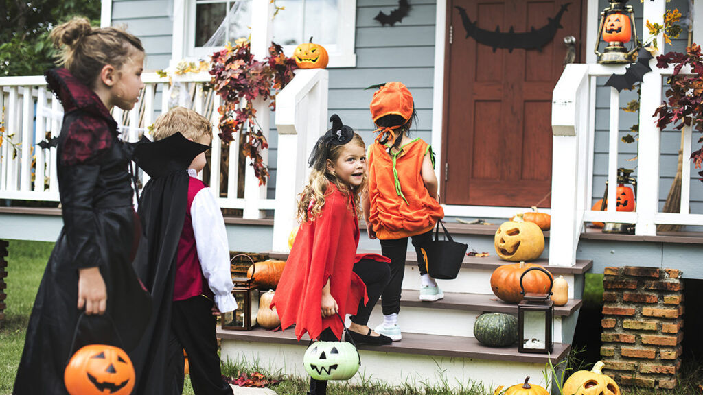 kid friendly halloween party kids in costumes trick or treating.