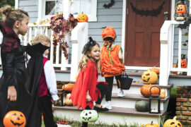 kid friendly halloween party kids in costumes trick or treating.