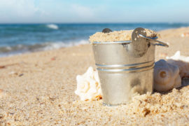Photo of a metal pail at the beach