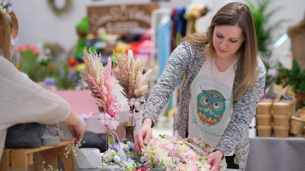 Photo of woman shopping at a local maker market