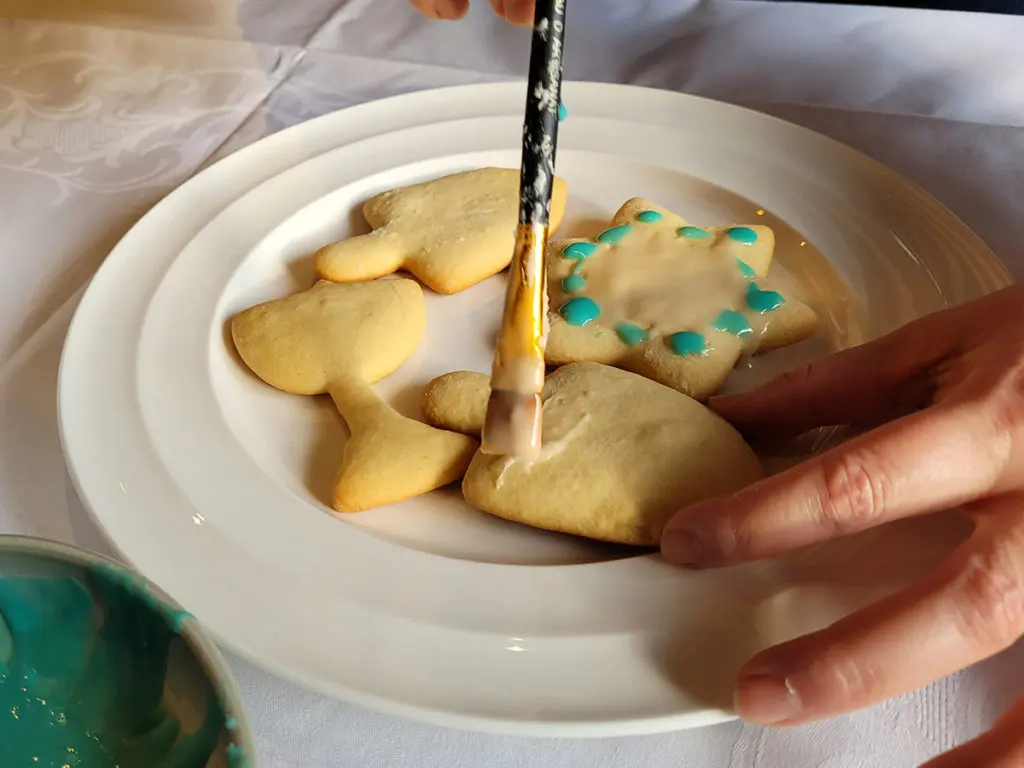 Photo of painting icing on a Hanukkah cookie