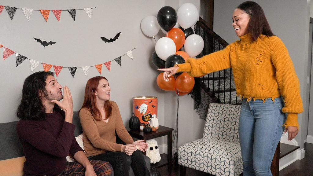 Photo of people playing Halloween charades