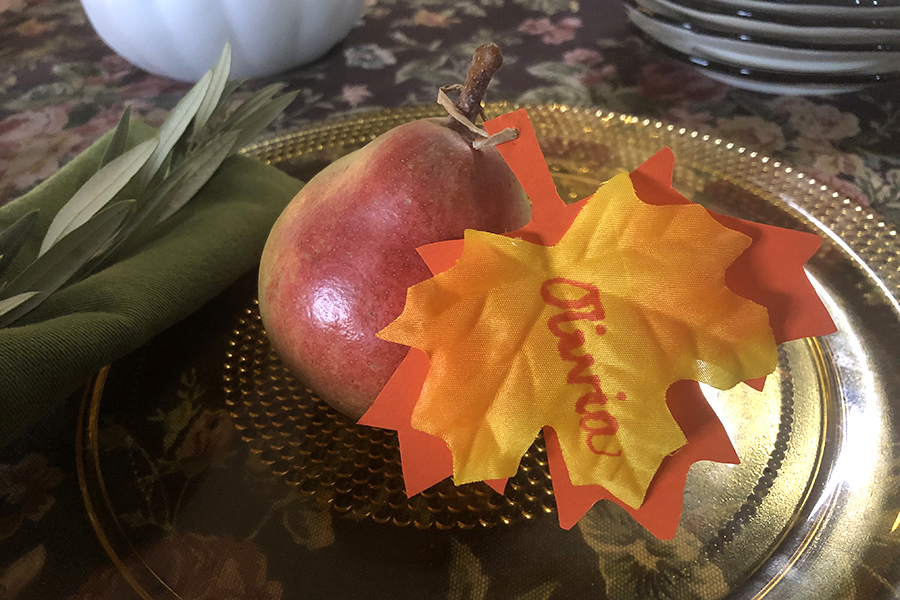 Photo of fabric autumn leaf with a pear