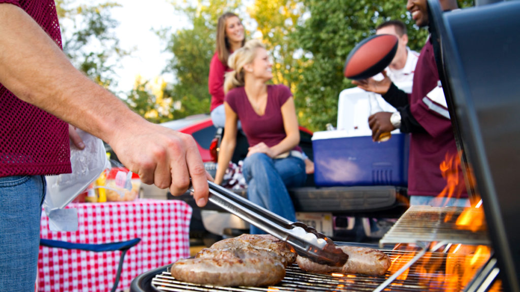 Photo of fans grilling at a tailgate