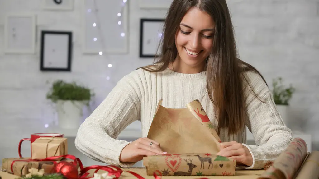 Photo of woman wrapping presents