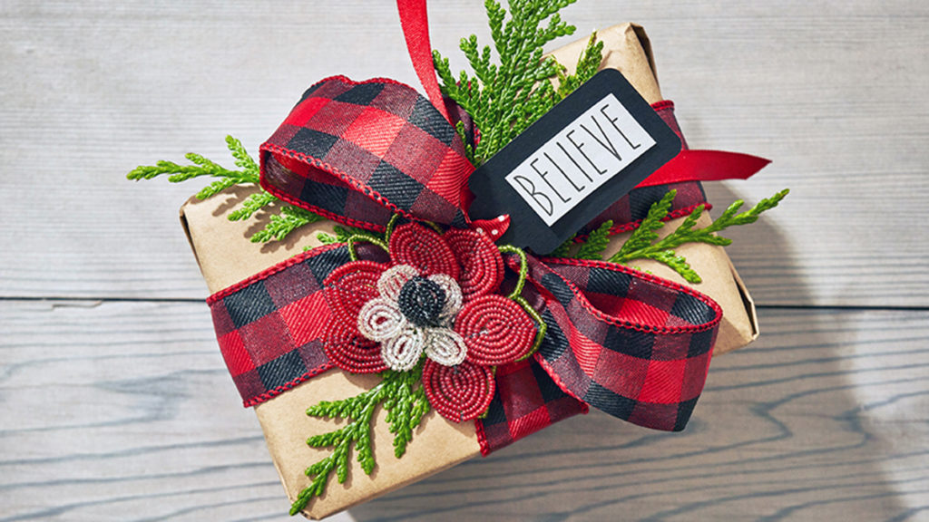 Photo of gift wrapped in farmhouse Christmas style