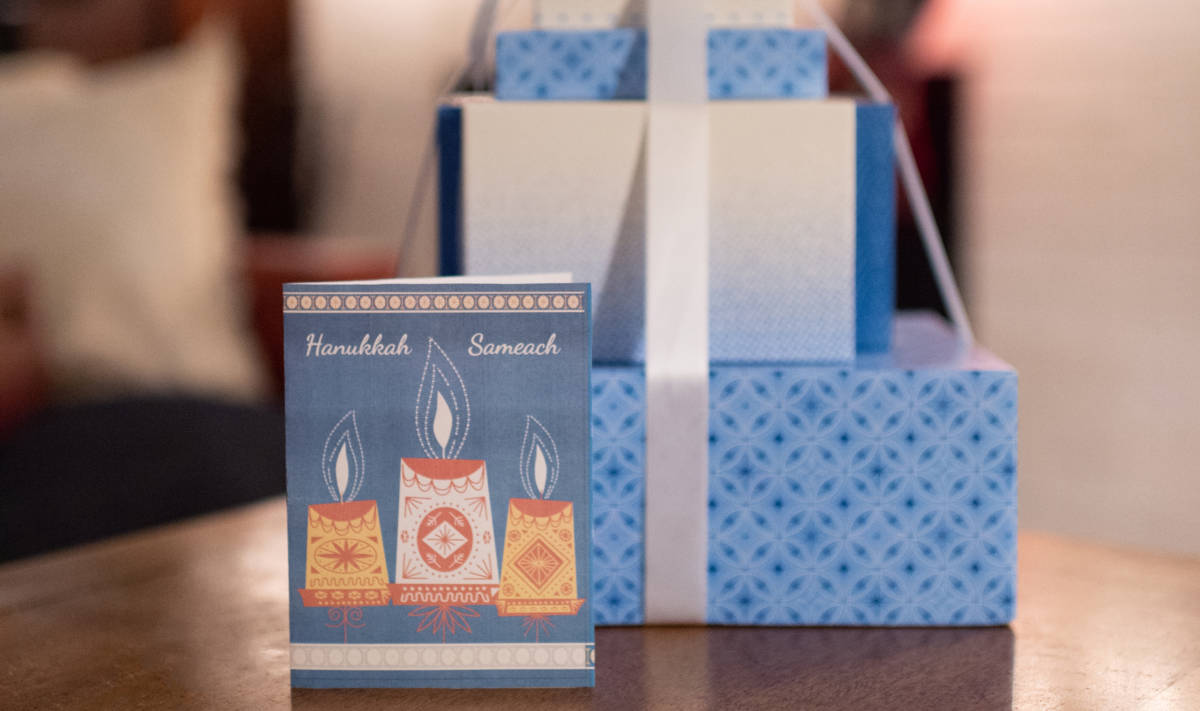 Photo of Hanukkah card and gifts