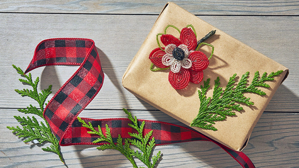 Photo of a gift wrapped in a farmhouse Christmas style