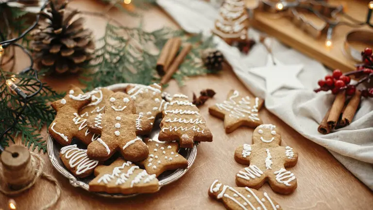 Gingerbread facts with a plate of gingerbread cookies on a platter.