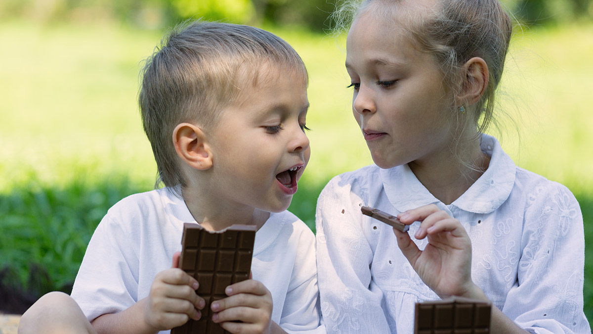 Photo of kids eating chocolate