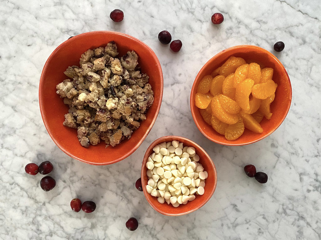 Ingredients for a bundt cake on a counter sitting in bowls