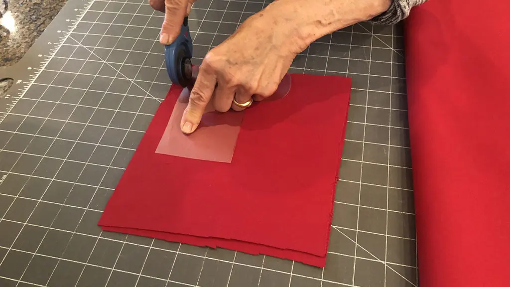 Photo of cutting a mini DIY Christmas stocking template