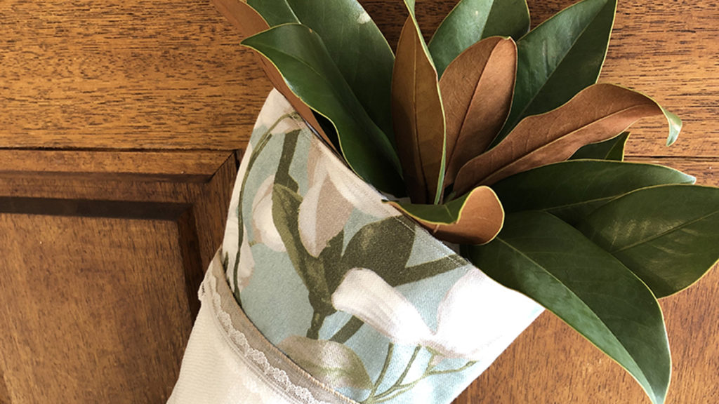DIY Christmas stocking with magnolia leaves