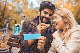Valentine's-Day-Gifts-by-Couple-Type: couple eating cookies