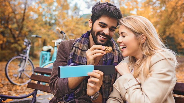 Valentine's-Day-Gifts-by-Couple-Type: couple eating cookies