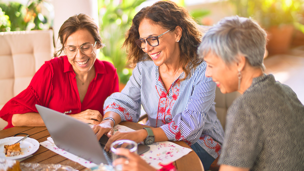 international women's day: women posting on social media