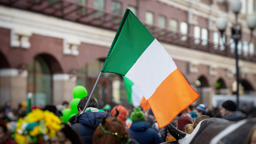 history of st. patrick's day: irish flag at parade