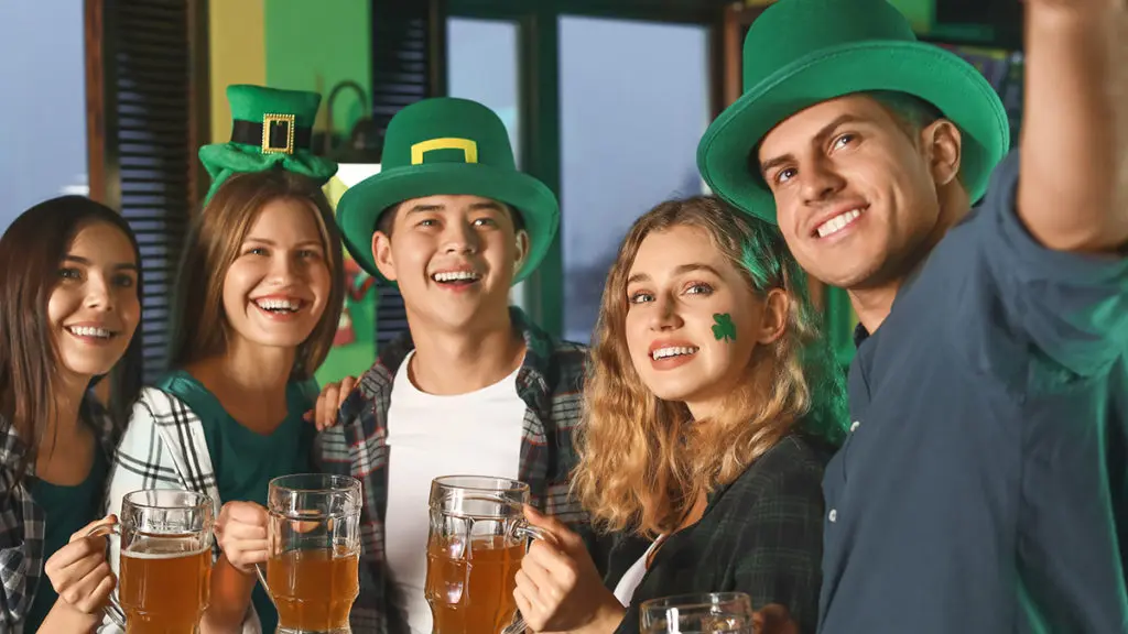 history-of-st-patricks-day: people celebrating st. patrick's day