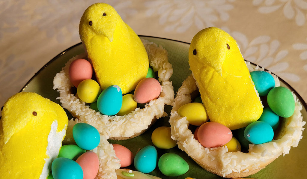 a photo of Easter cookie decorating: Easter nests
