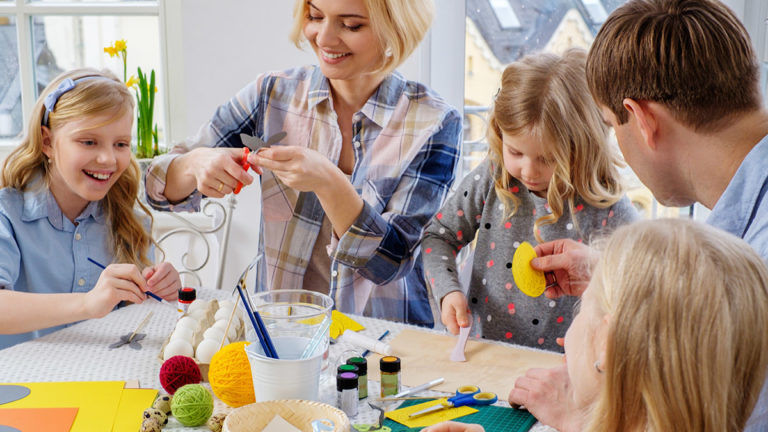 A photo of Easter crafts with family making easter crafts