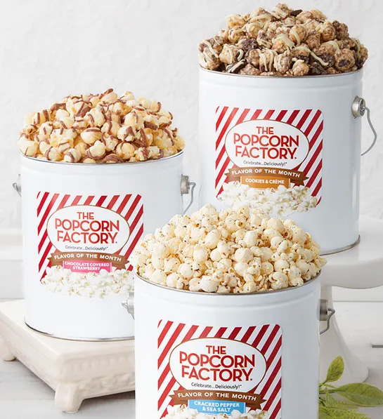 a photo of 50th birthday gift ideas: tins of popcorn