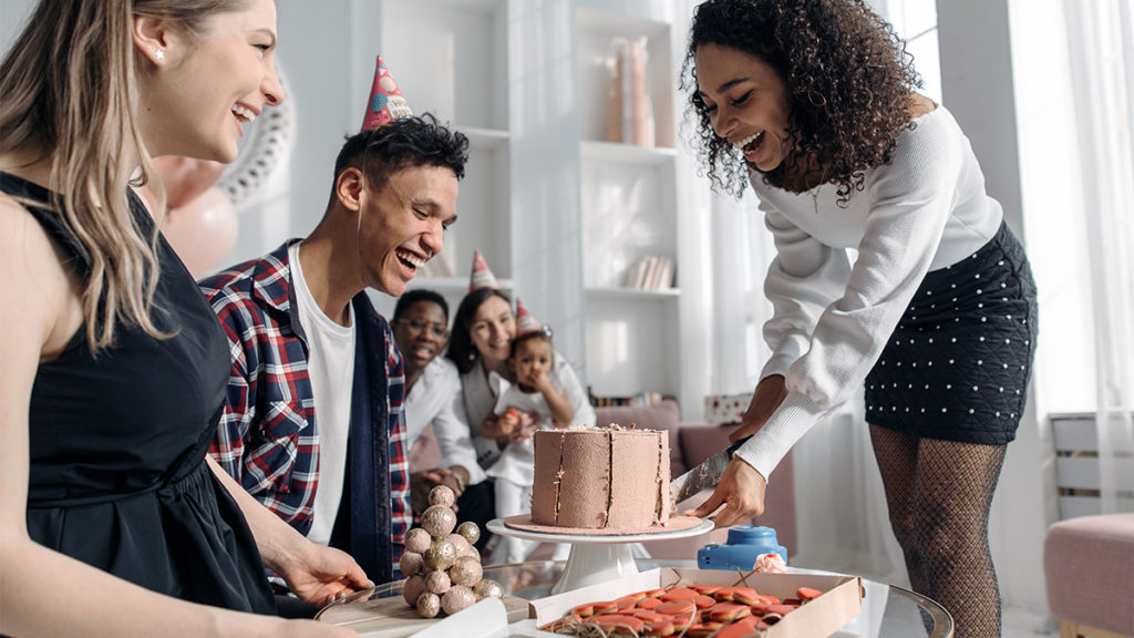 a photo of why every birthday is special:  friends celebrating a birthday