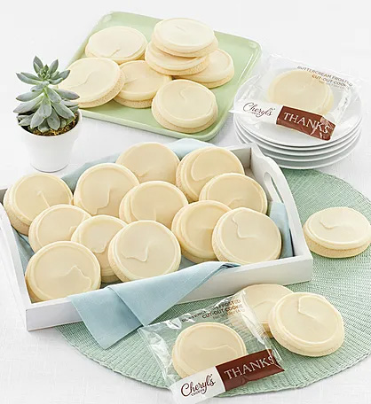 a photo of gift ideas for administrative professionals day: buttercream frosted thank you cookies