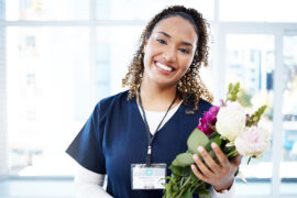nurses week nurse holding a bouquet of flowers