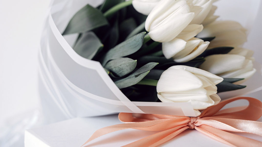 a photo of psychology of gifting with a bouquet of flowers