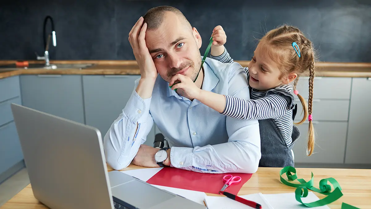 a photo of dad brain with a dad working from home with his daughter