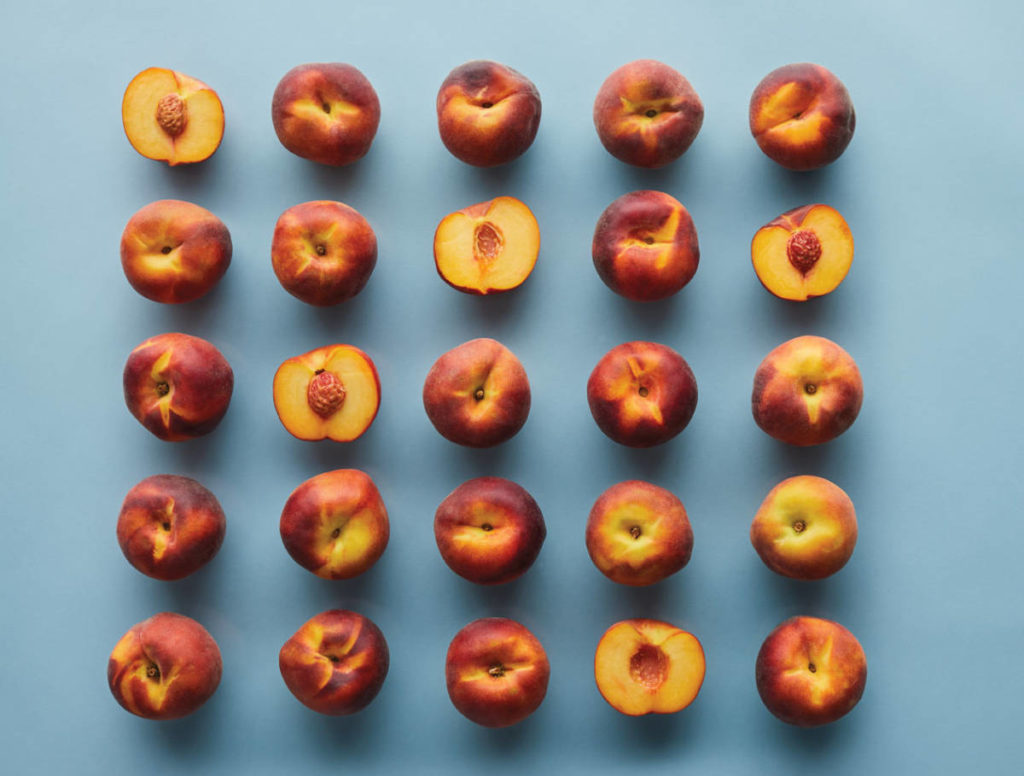 a photo of facts about peaches with peaches in rows