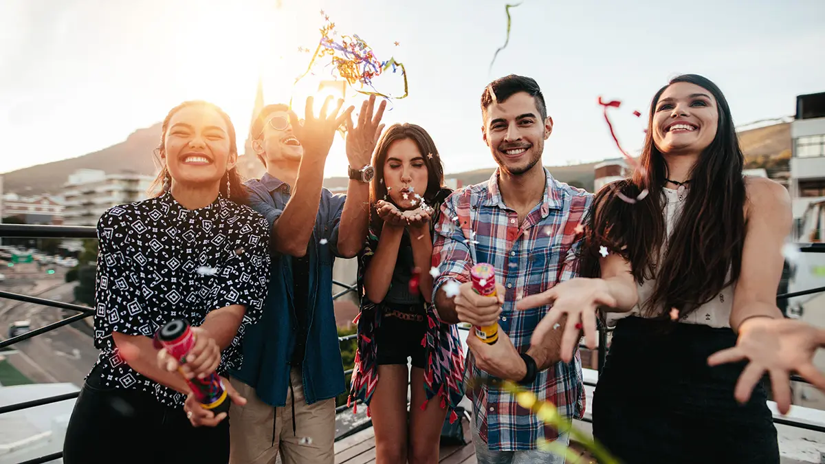 photo of 18th birthday ideas with group of friends celebrating a birthday