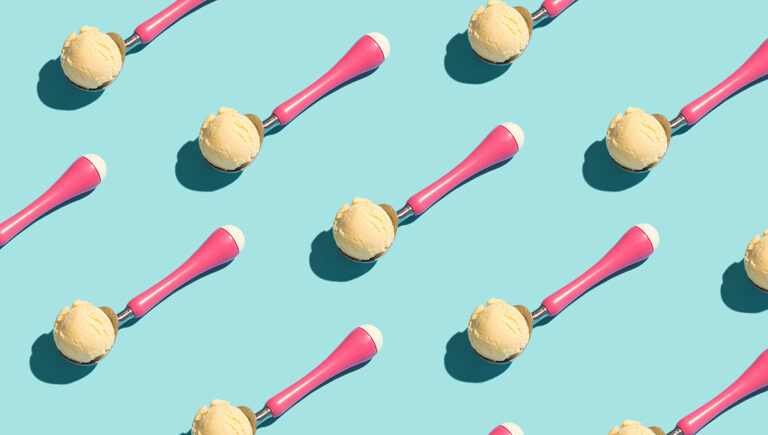 history of ice cream with vanilla Ice cream scoops in pink spoons in food pattern.